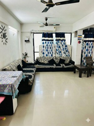 Living Room in 2 BHK Apartment at Sargasan – for Sale