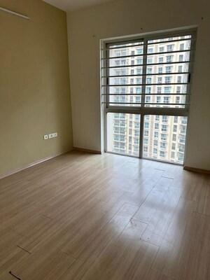 Bedroom in 2 BHK Apartment at Sheth Vasant Lawns, Laxmi Nagar – for Rent