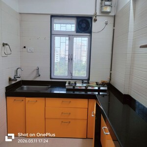 Kitchen in 1 BHK Apartment at Cosmos Classique, Ghodbunder Road – for Sale