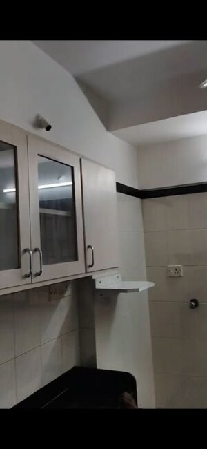 Kitchen in 3 BHK Apartment at Serenity Heights, Malad West – for Rent