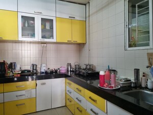 Kitchen in 3 BHK Apartment at Royal Heights Pune, Bopodi – for Rent