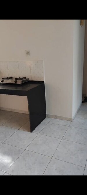 Kitchen in 2 BHK Apartment at Magarpatta Grevillea, Hadapsar – for Rent