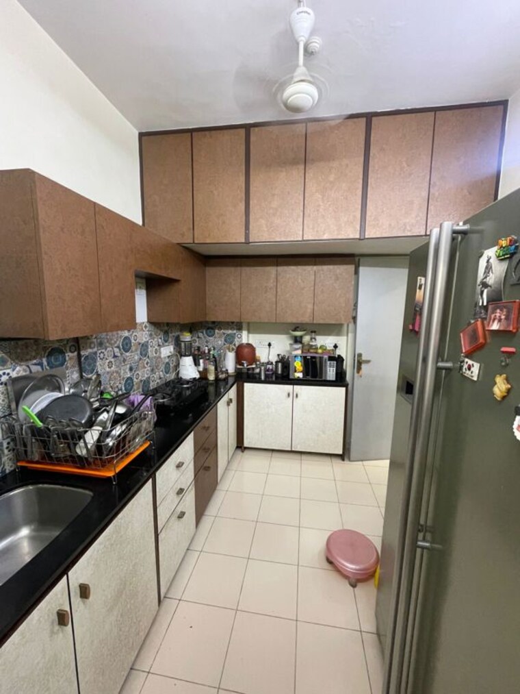 Kitchen, sunaina-apartments-santacruz 2 Bedroom 725 Sq.Ft. Apartment In Santacruz West Mumbai 10201896