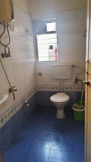 Bathroom in 2 BHK Apartment at Runwal Regency, Majiwada – for Rent