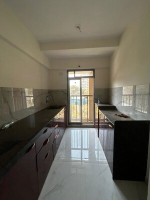 Kitchen in 2 BHK Apartment at Rosa Manhattan, Ghodbunder Road – for Rent