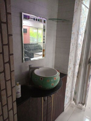 Bathroom in 3 BHK Apartment at Ganesham Phase I, Pimple Saudagar – for Rent