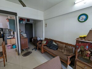 Living Room in 1 BHK Apartment at Bhoomi Acres, Thane West – for Rent