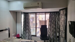 Living Room in 1.5 BHK Apartment at Omkar Raga, Chembur – for Rent