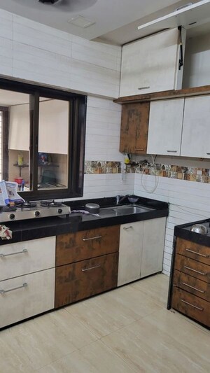 Kitchen in 1.5 BHK Apartment at Omkar Raga, Chembur – for Rent