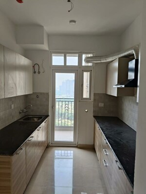 Kitchen in 3 BHK Apartment at ATS Homekraft Pious Orchards, Sector 150 – for Sale