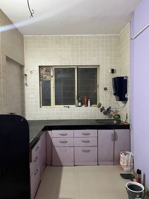 Kitchen in 2 BHK Apartment at Roma Galaxy, Pimple Saudagar – for Rent