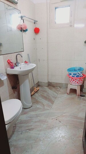 Bathroom in 4 BHK Apartment at Sai Enclave Niti Khand, Niti Khand – for Sale
