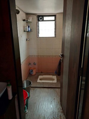 Bathroom in 2 BHK Apartment at Kalyan West – for Sale