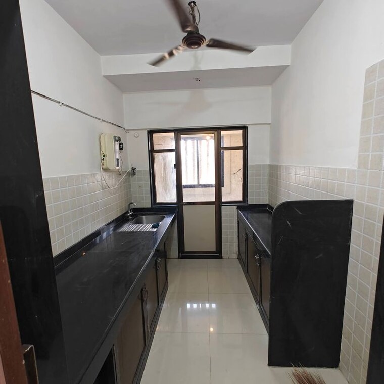Kitchen, pooja-chs-andheri-west 2 Bedroom 750 Sq.Ft. Apartment In Andheri West Mumbai 10203600