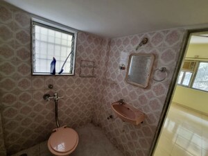Bathroom in 2 BHK Apartment at Green Acres Apartment, Waghbil – for Rent