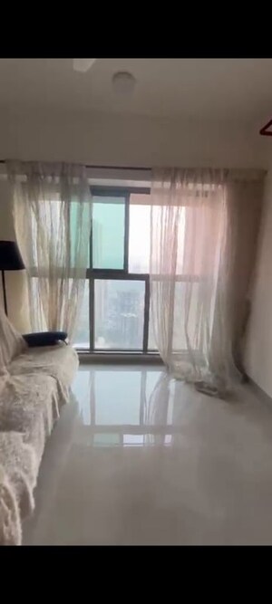 Living Room in 2 BHK Apartment at Sheth Auris Bliss, Malad West – for Rent