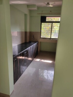 Kitchen in 2 BHK Apartment at Vijay Vatika, Kavesar – for Rent