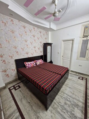 Bedroom in 2 BHK Builder Floor at Soho Awas Apartments, Gyan Khand I – for Rent