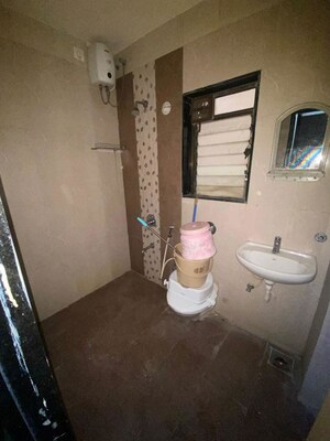 Bathroom in 2 BHK Apartment at Shree Satya Shankar Residency, Manpada – for Rent