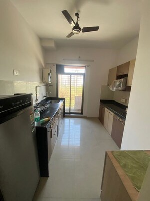 Kitchen in 2 BHK Apartment at Shree Satya Shankar Residency, Manpada – for Rent