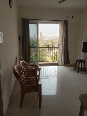 Living Room in 1 BHK Apartment at Vijay Orovia, Ghodbunder Road – for Rent