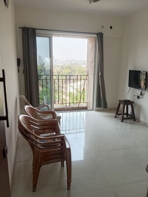 Living Room in 1 BHK Apartment at Vijay Orovia, Ghodbunder Road – for Rent