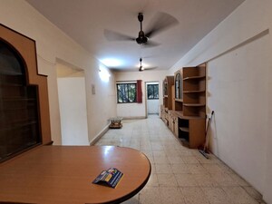 Living Room in 2 BHK Apartment at Takshila CHS, Andheri East – for Sale