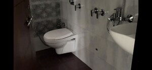 Bathroom in 1 BHK Apartment at Lodha Global Park, Dombivli East – for Rent