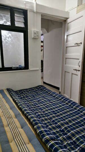 Bedroom in 2 BHK Apartment at Dudhsagar Apartment, Goregaon East – for Rent