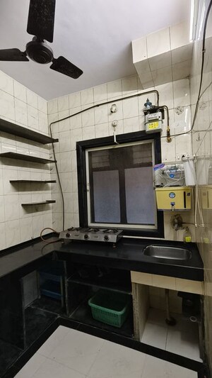 Kitchen in 2 BHK Apartment at Dudhsagar Apartment, Goregaon East – for Rent