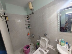 Bathroom in 2 BHK Apartment at Puranik City, Kasarvadavali – for Rent