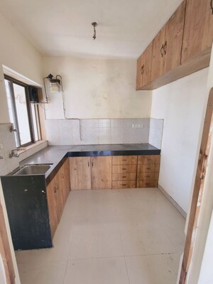 Kitchen in 2 BHK Apartment at Runwal Garden City, Balkum Pada – for Rent