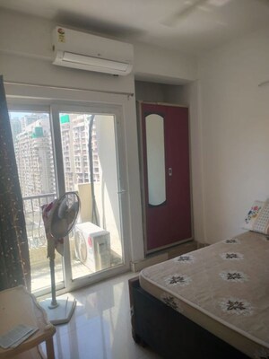 Living Room in 1 BHK Apartment at Nimbus The Hyde park, Sector 78 – for Rent