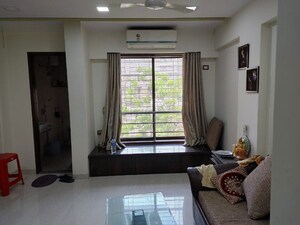 Living Room in 1 BHK Apartment at Chaitanya Vrindavan, Vile Parle East – for Sale