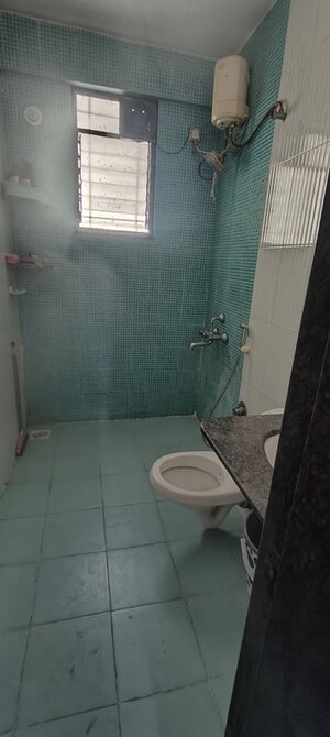 Bathroom in 2 BHK Apartment at Sukhwani Palm Breeze, Pimple Saudagar – for Sale