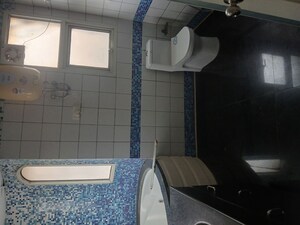 Bathroom in 3.5 BHK Apartment at Omaxe The Nile, Sector 49 – for Rent
