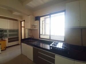 Kitchen in 4 BHK Apartment at Lodha Luxuria, Majiwada – for Rent