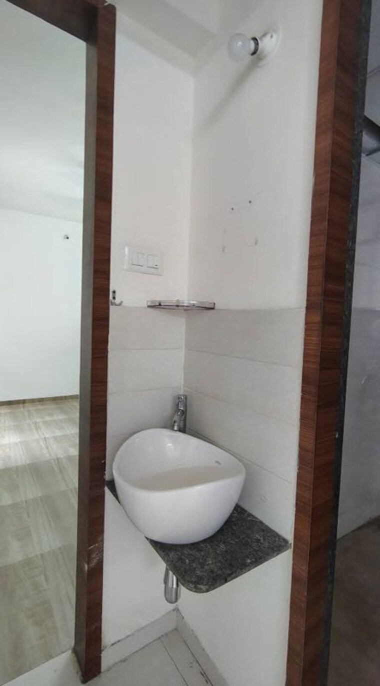 Bathroom, saheel-itrend-life-3 2 Bedroom 700 Sq.Ft. Apartment In Wakad Pune 10205613