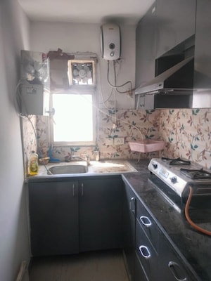 Kitchen in 1 BHK Apartment at Nimbus The Hyde park, Sector 78 – for Rent