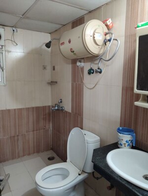 Bathroom in 2 BHK Apartment at Nimbus The Hyde park, Sector 78 – for Rent