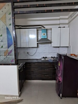 Kitchen in 2.5 BHK Apartment at Mahagun My Woods, Sector 16c Greater Noida – for Sale