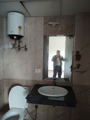 Bathroom in 3 BHK Apartment at Nimbus The Hyde park, Sector 78 – for Rent