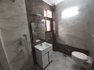 Bathroom in 3 BHK Builder Floor at Kalkaji – for Rent