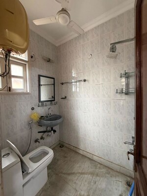 Bathroom in 3 BHK Builder Floor at Kalkaji – for Rent
