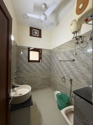 Bathroom in 2 BHK Builder Floor at Kalkaji – for Rent