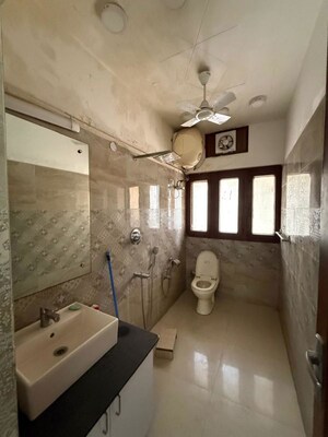 Bathroom in 2 BHK Builder Floor at Kalkaji – for Rent