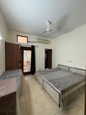 Bedroom in 2 BHK Builder Floor at Kalkaji – for Rent