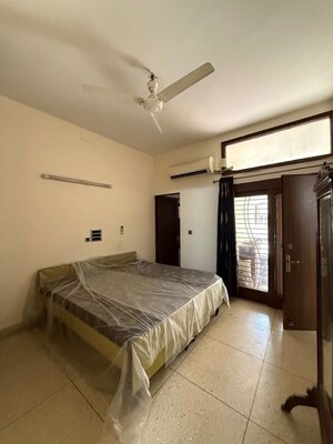 Bedroom in 2 BHK Builder Floor at Kalkaji – for Rent