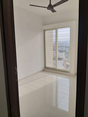 Room in 2 BHK Apartment at Shivam 19 Grand West, Thergaon – for Rent