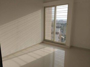 Bedroom in 2 BHK Apartment at Shivam 19 Grand West, Thergaon – for Rent